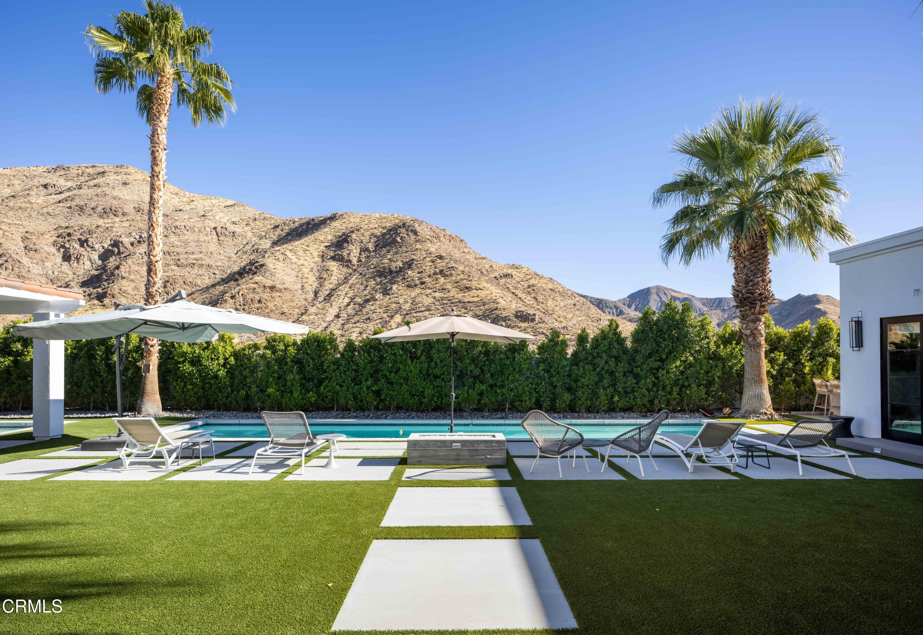 3076 Arroyo Seco Palm Springs, CA 92264 - Photo 8 of 37 a view of a swimming pool with a patio
