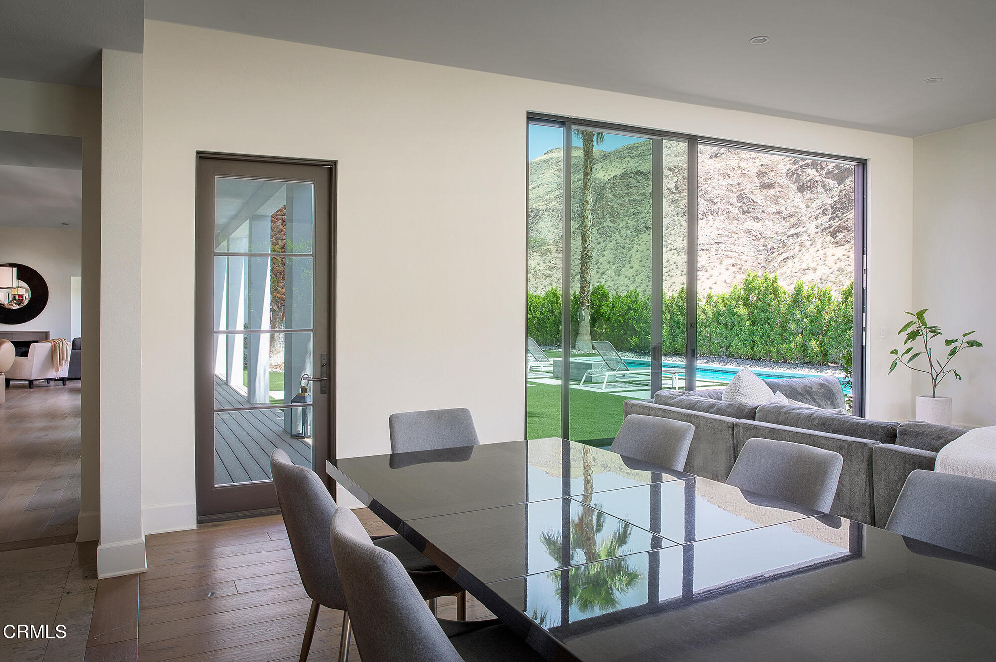 3076 Arroyo Seco Palm Springs, CA 92264 - Photo 10 of 37 a view of a dining room with furniture window and outside view