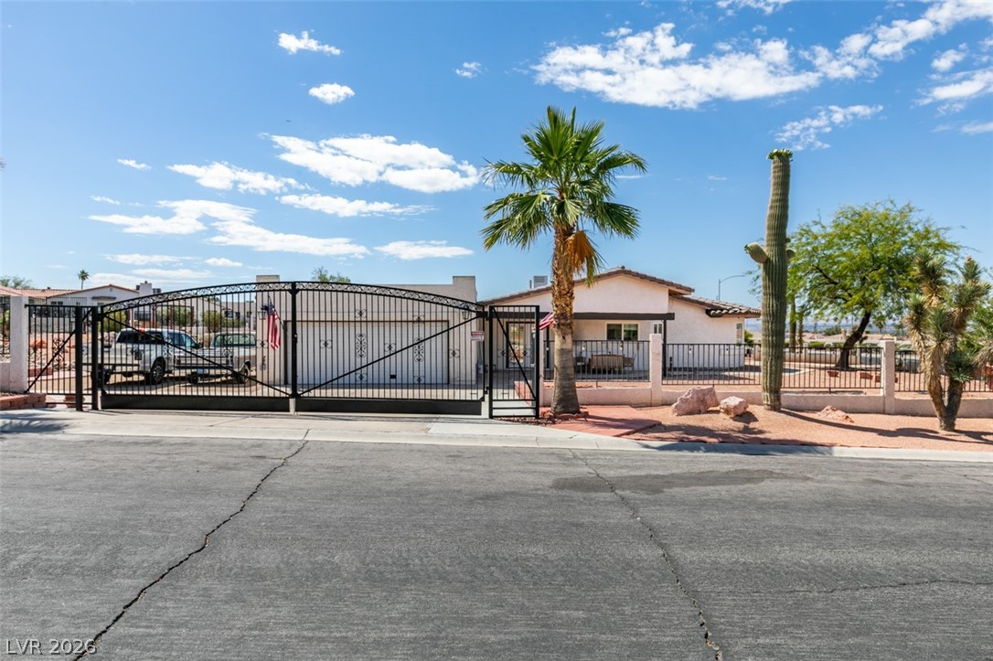 892 North Hollywood Boulevard Las Vegas, NV 89110 - Photo 48 of 81 This property features a private gated entry, with desert landscaping, and a fenced yard.