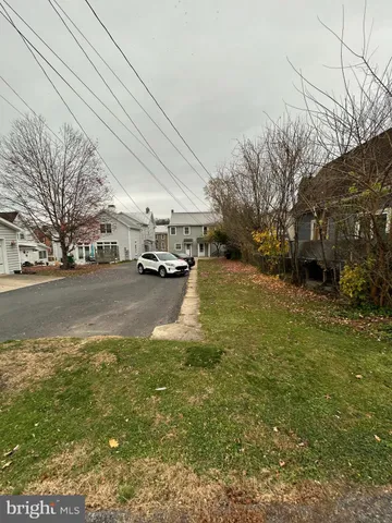 a view of a street with houses