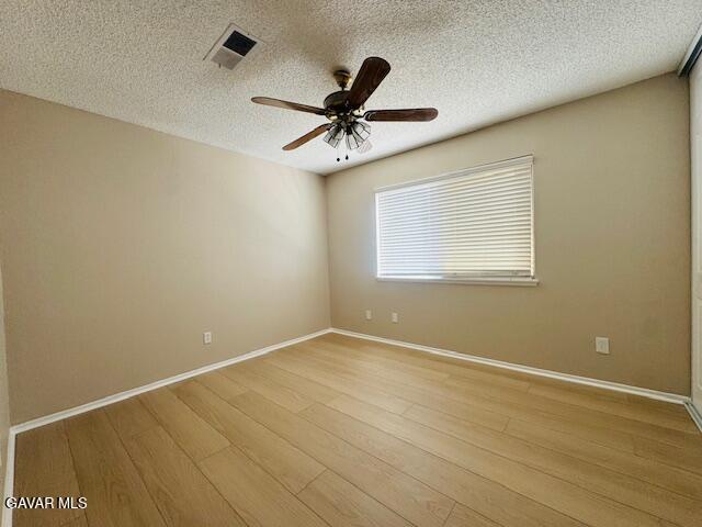 42636 Roadrunner Way Lancaster, CA 93536 - Photo 11 of 19 an empty room with windows and fan
