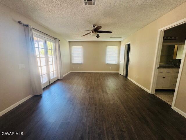 42636 Roadrunner Way Lancaster, CA 93536 - Photo 14 of 19 wooden floor in an empty room with a window