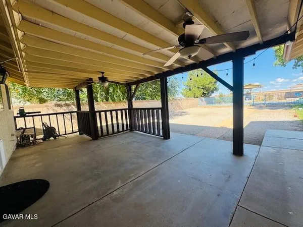 a view of porch with green space