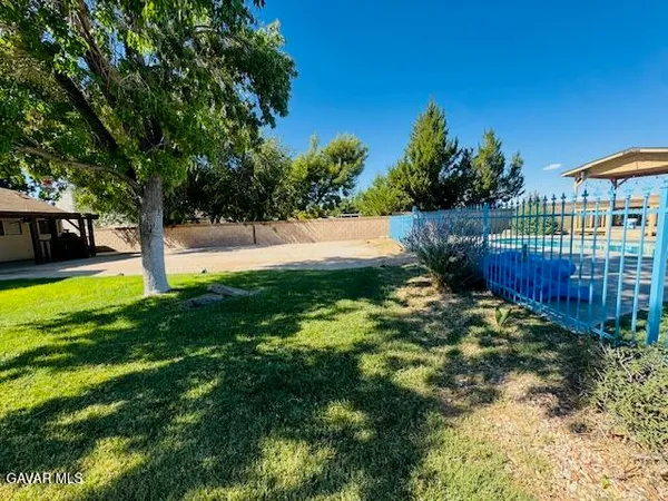 a view of backyard with green space