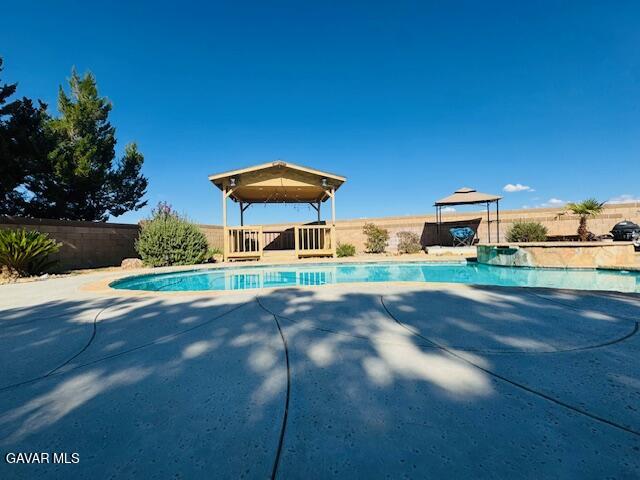 42636 Roadrunner Way Lancaster, CA 93536 - Photo 2 of 19 a front view of a house with a yard