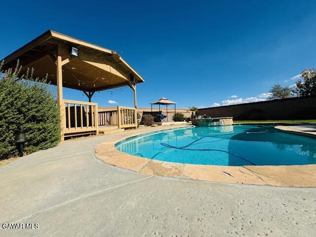 42636 Roadrunner Way Lancaster, CA 93536 - Photo 4 of 19 a view of a house with backyard and sitting area