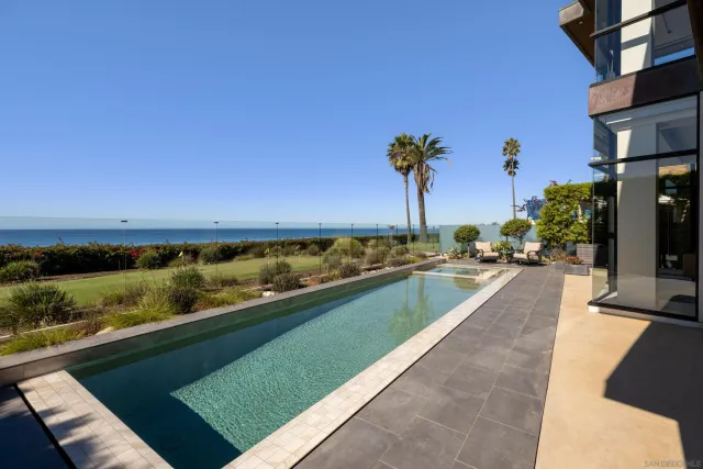 a view of swimming pool from a balcony