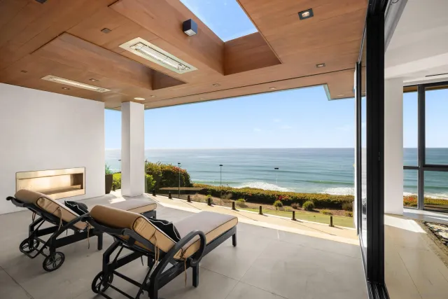 a view of a outdoor space with lounge chair