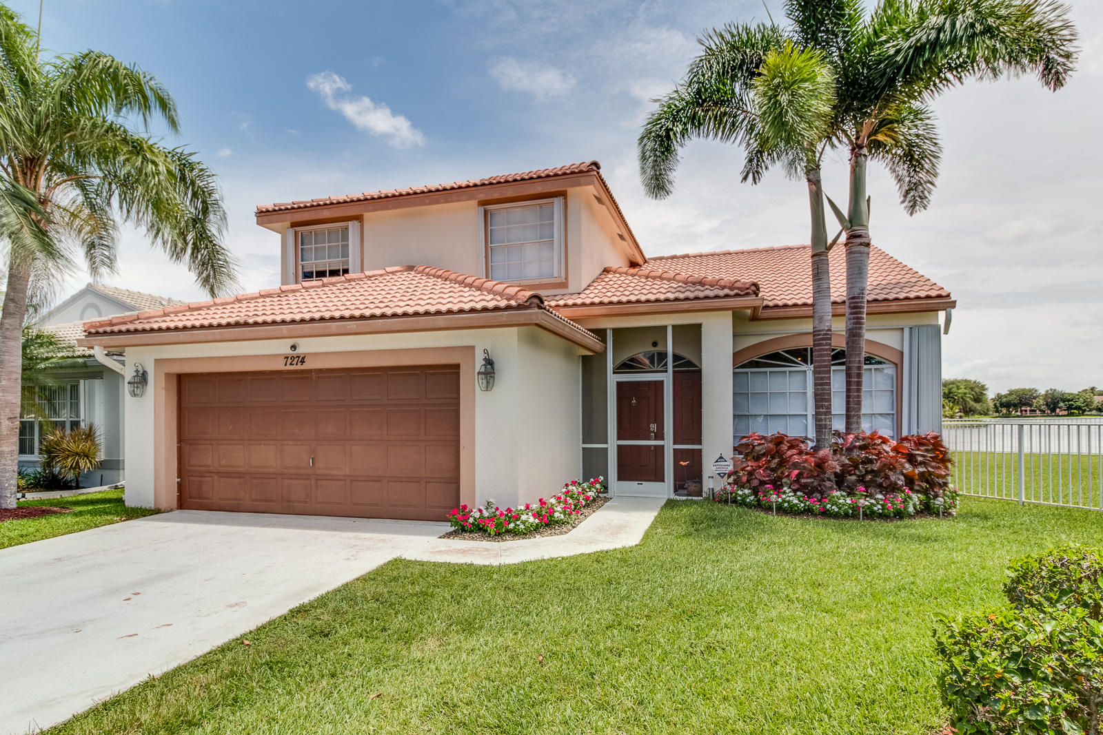 7274 Michigan Isle Road Lake Worth, FL 33467 - Photo 1 of 29 Exterior Front