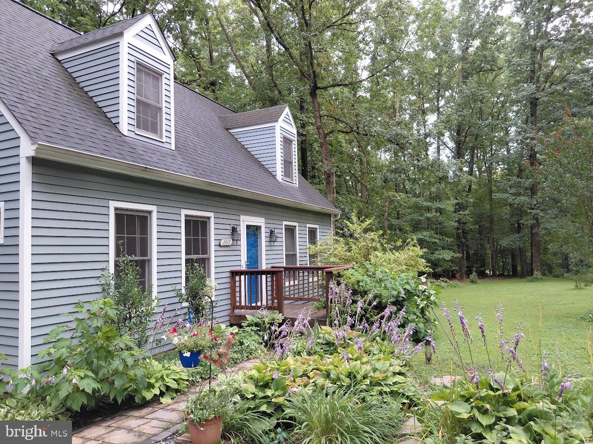 3917 Basford Road Frederick, MD 21703 - Photo 20 of 36 a front view of a house with a yard