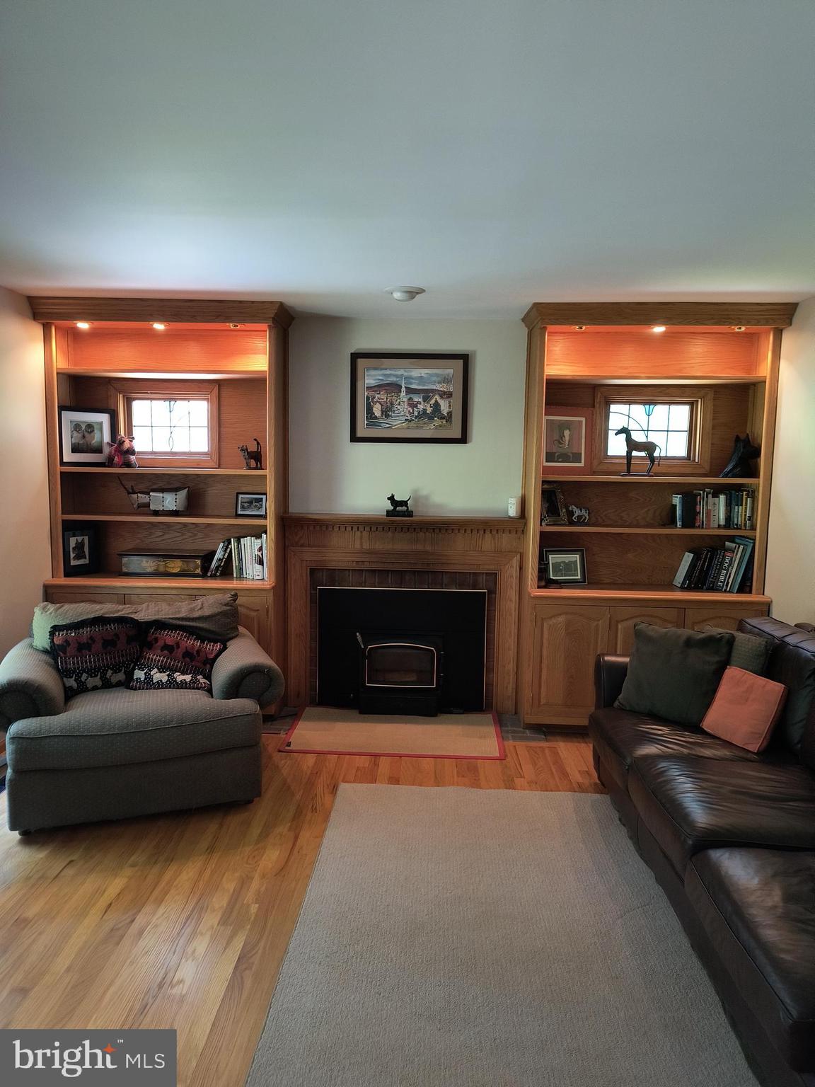 3917 Basford Road Frederick, MD 21703 - Photo 34 of 36 a living room with furniture and a flat screen tv