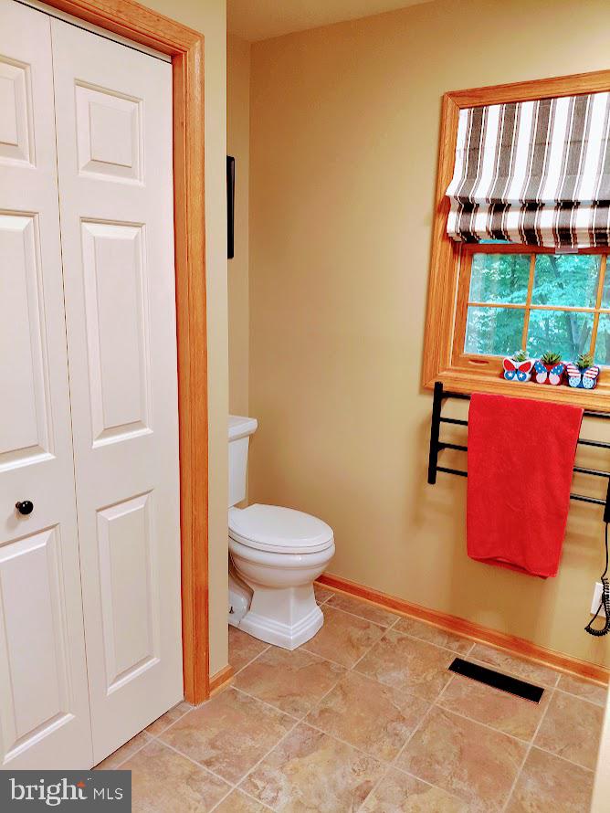 3917 Basford Road Frederick, MD 21703 - Photo 9 of 36 a bathroom with a toilet