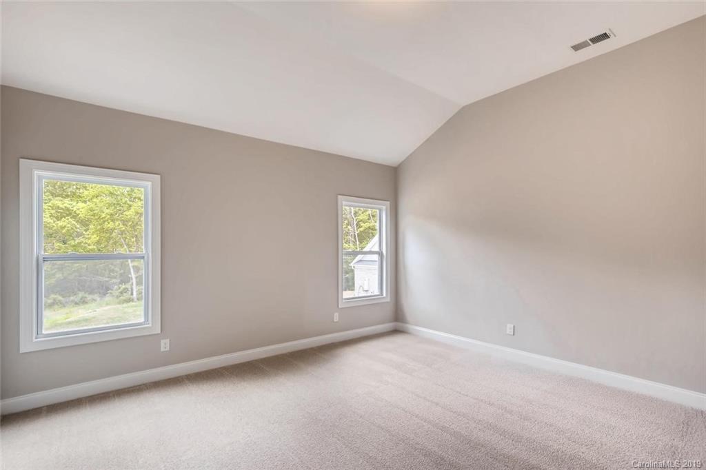 5019 Mill Creek Road, Unit 22 Clover, SC 29710 - Photo 8 of 13 an empty room with windows