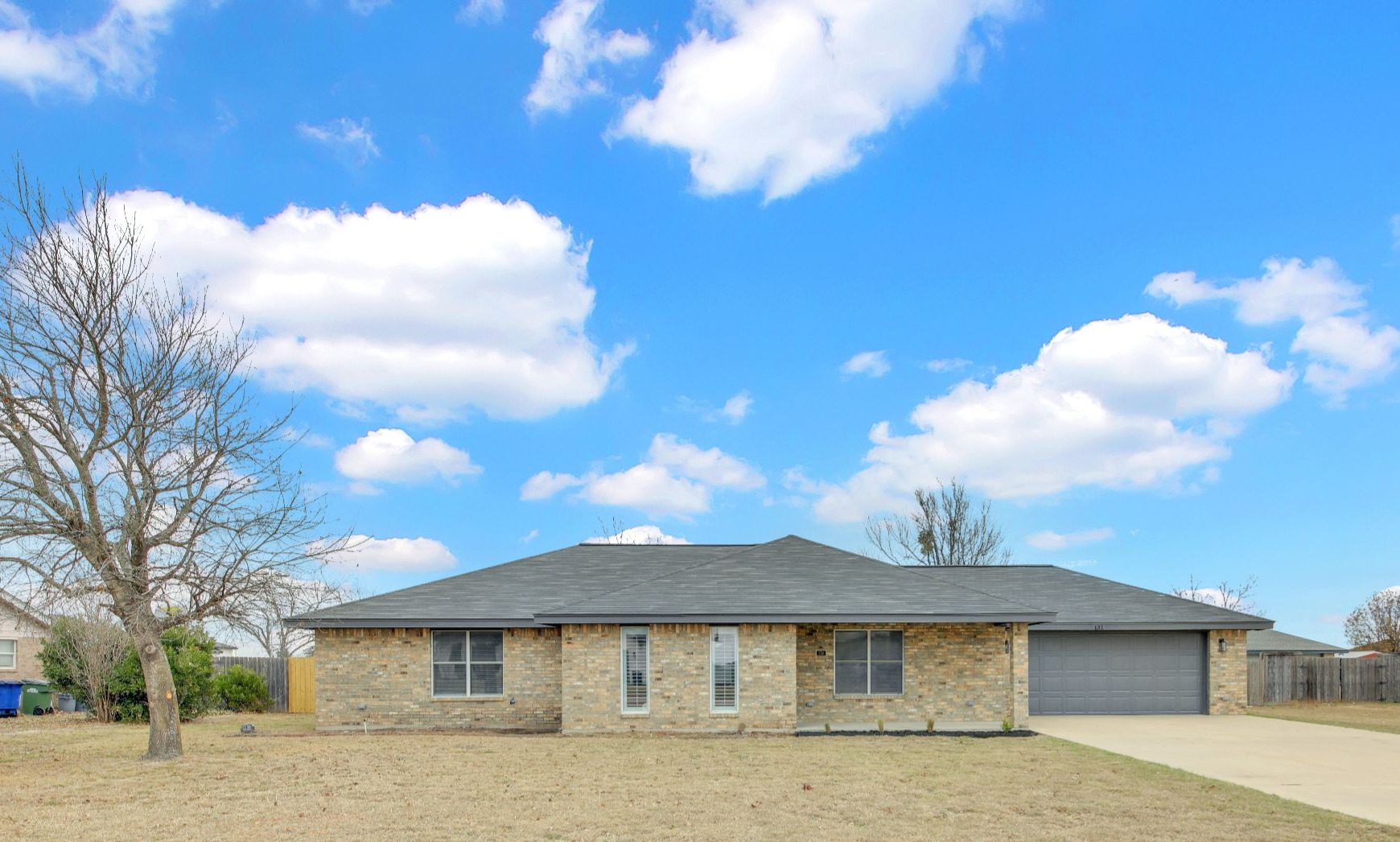 131 Meadow Valley Loop Jarrell, TX 76537 - Photo 4 of 32 Front view of home - located on 1/2 acre lot