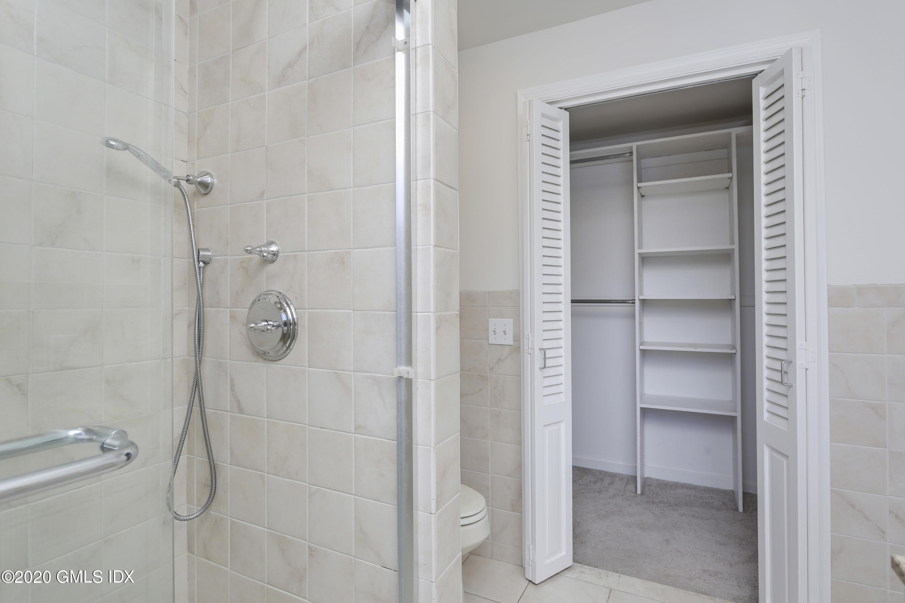 18 Norias Road Greenwich, CT 06830 - Photo 13 of 37 a bathroom with a granite countertop shower