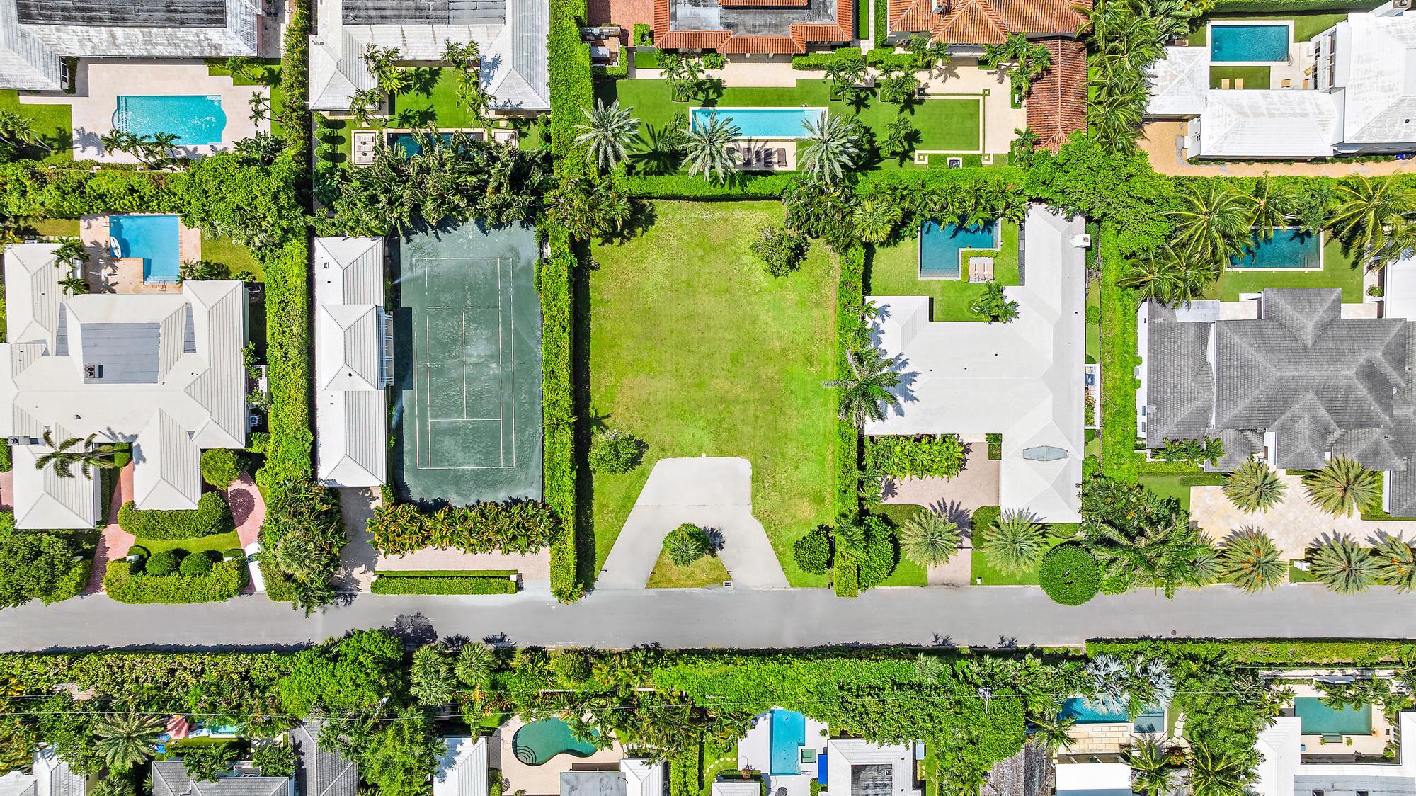 254 North Woods Road Palm Beach, FL 33480 - Photo 3 of 5 an aerial view of a house with a garden and plants