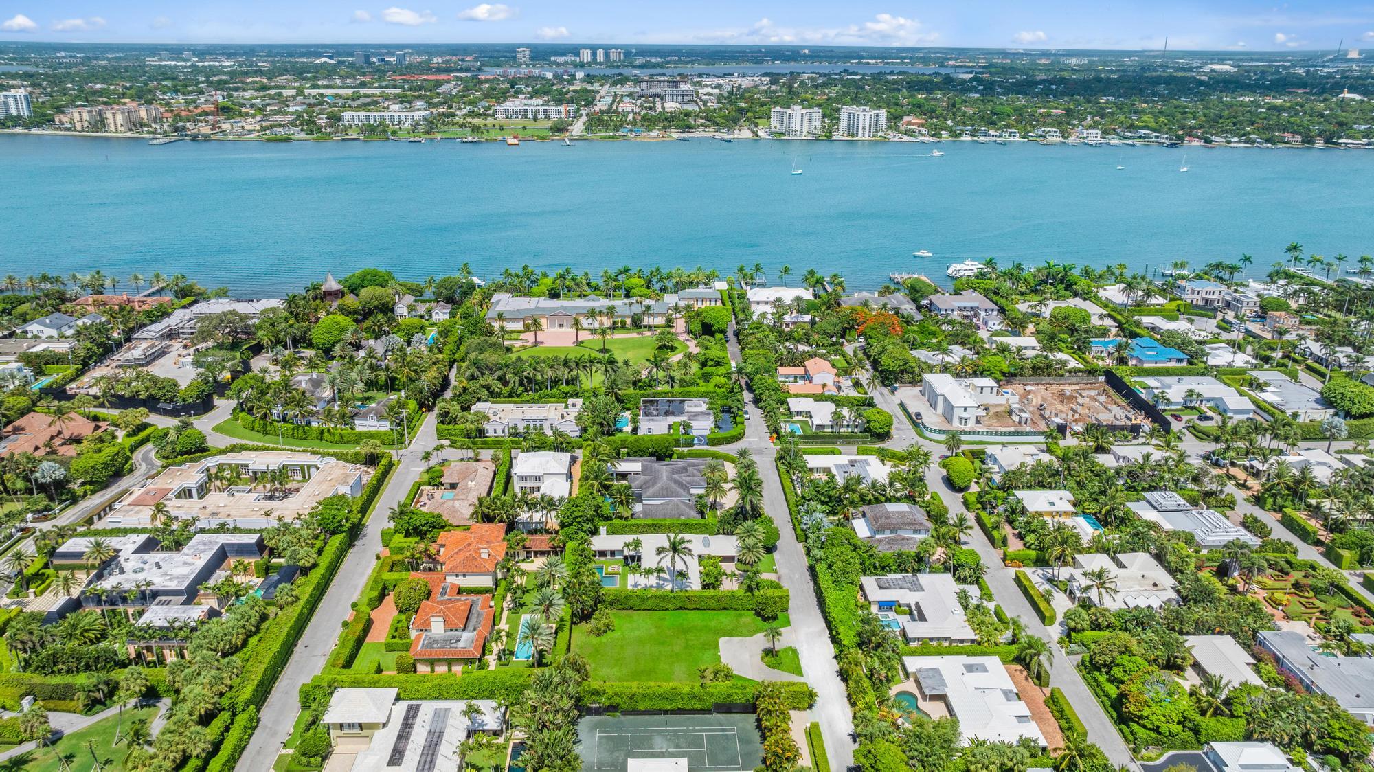 254 North Woods Road Palm Beach, FL 33480 - Photo 5 of 5 an aerial view of lake residential house with swimming pool and mountain view