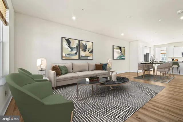 a living room with furniture and a table