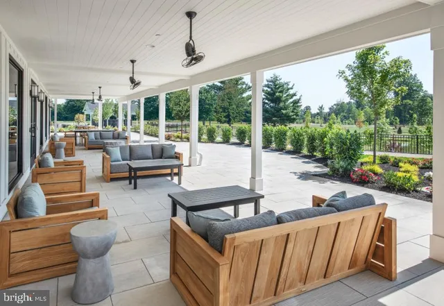 a outdoor space with patio the couches and chairs