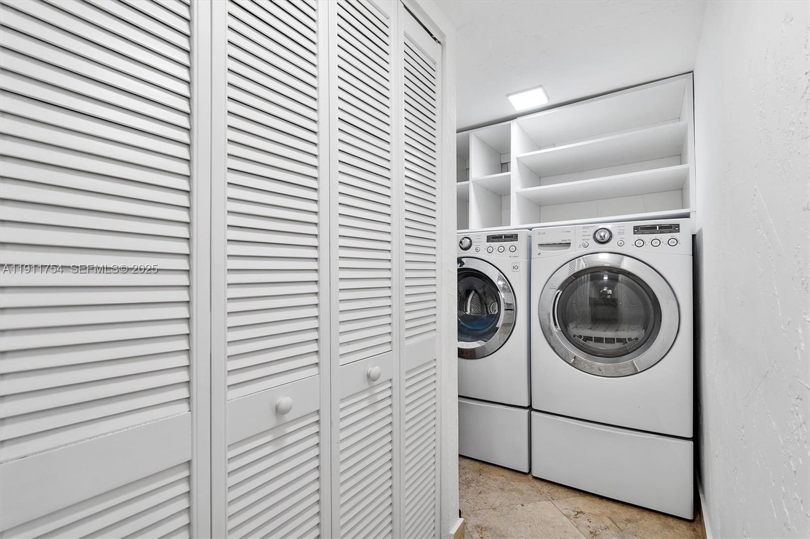 3235 McDonald Street, Unit 5 Miami, FL 33133 - Photo 12 of 35 a utility room with dryer and washer