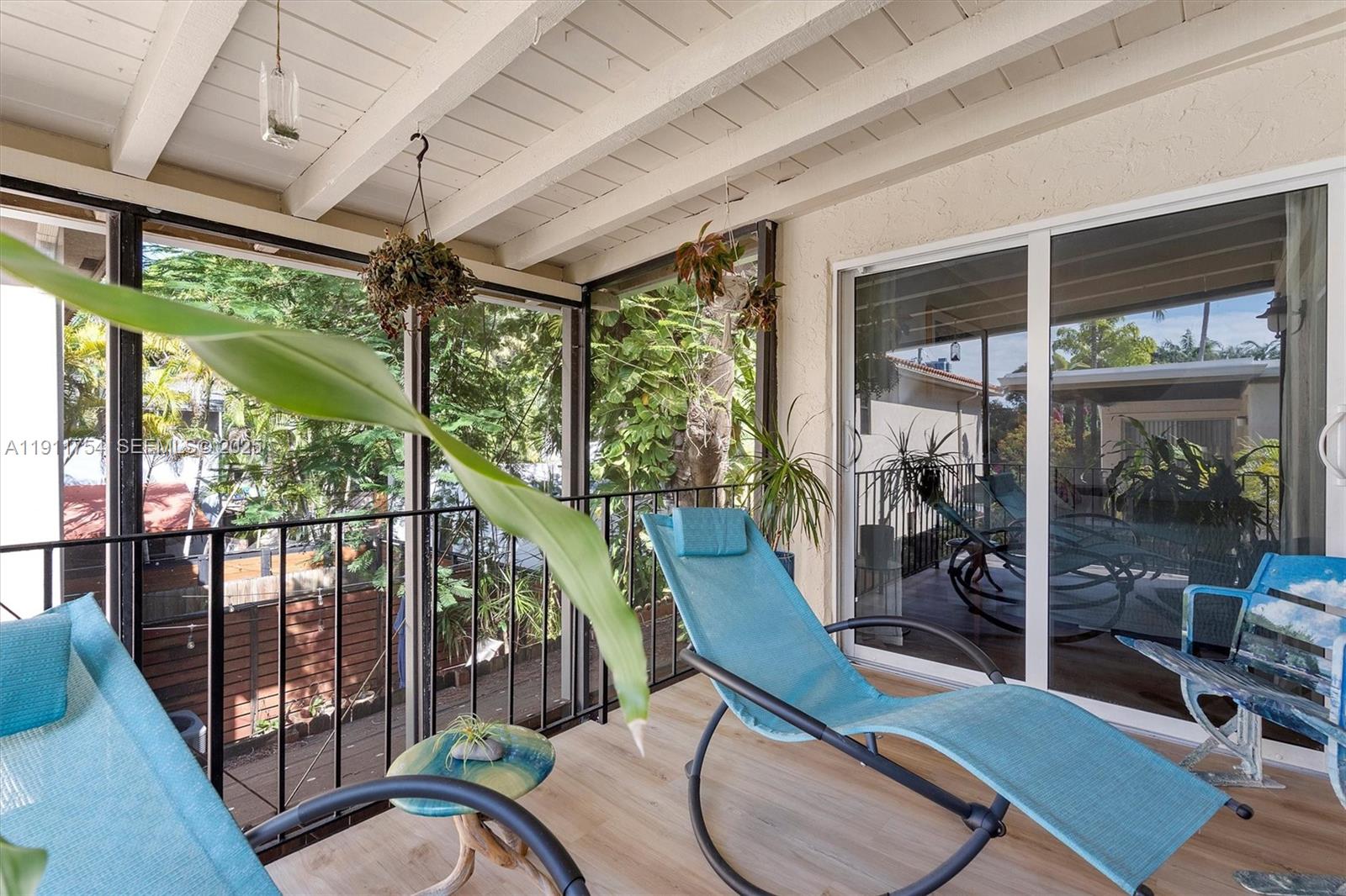 3235 McDonald Street, Unit 5 Miami, FL 33133 - Photo 21 of 35 a view of a porch with furniture