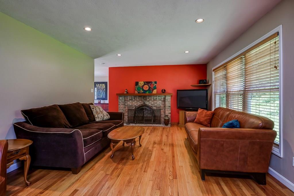 5454 Hardt Road Gibsonia, PA 15044 - Photo 3 of 21 Living room with brick fireplace and large window!