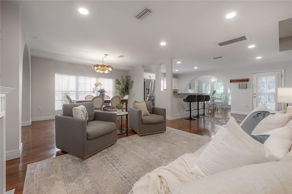 3108 West Villa Rosa Street Tampa, FL 33611 - Photo 6 of 58 a living room with furniture and a view of kitchen