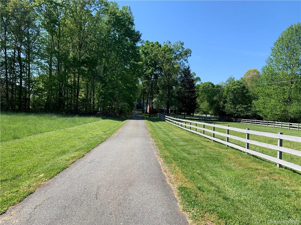 15015 Ranson Road Huntersville, NC 28078 - Photo 2 of 19 a view of a park with large trees