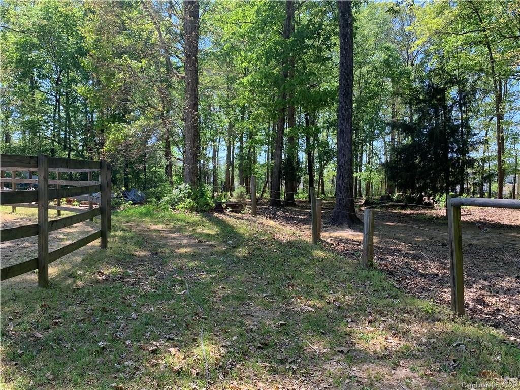 15015 Ranson Road Huntersville, NC 28078 - Photo 17 of 19 a view of outdoor space with lots of trees