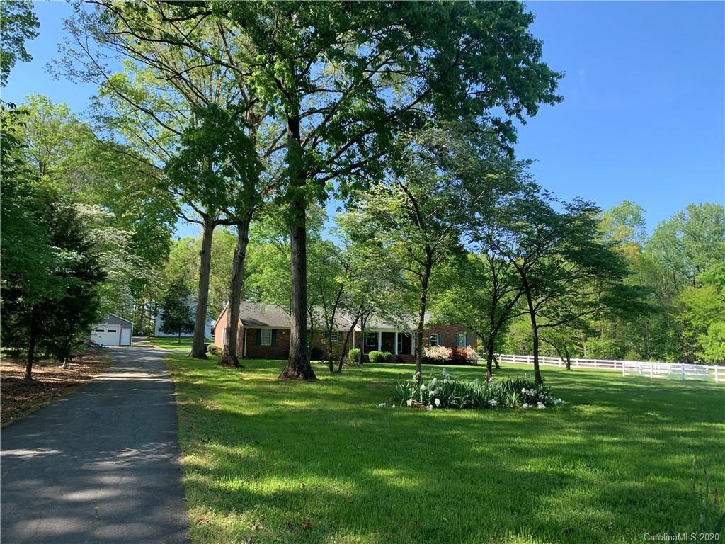15015 Ranson Road Huntersville, NC 28078 - Photo 3 of 19 a huge green field with lots of trees