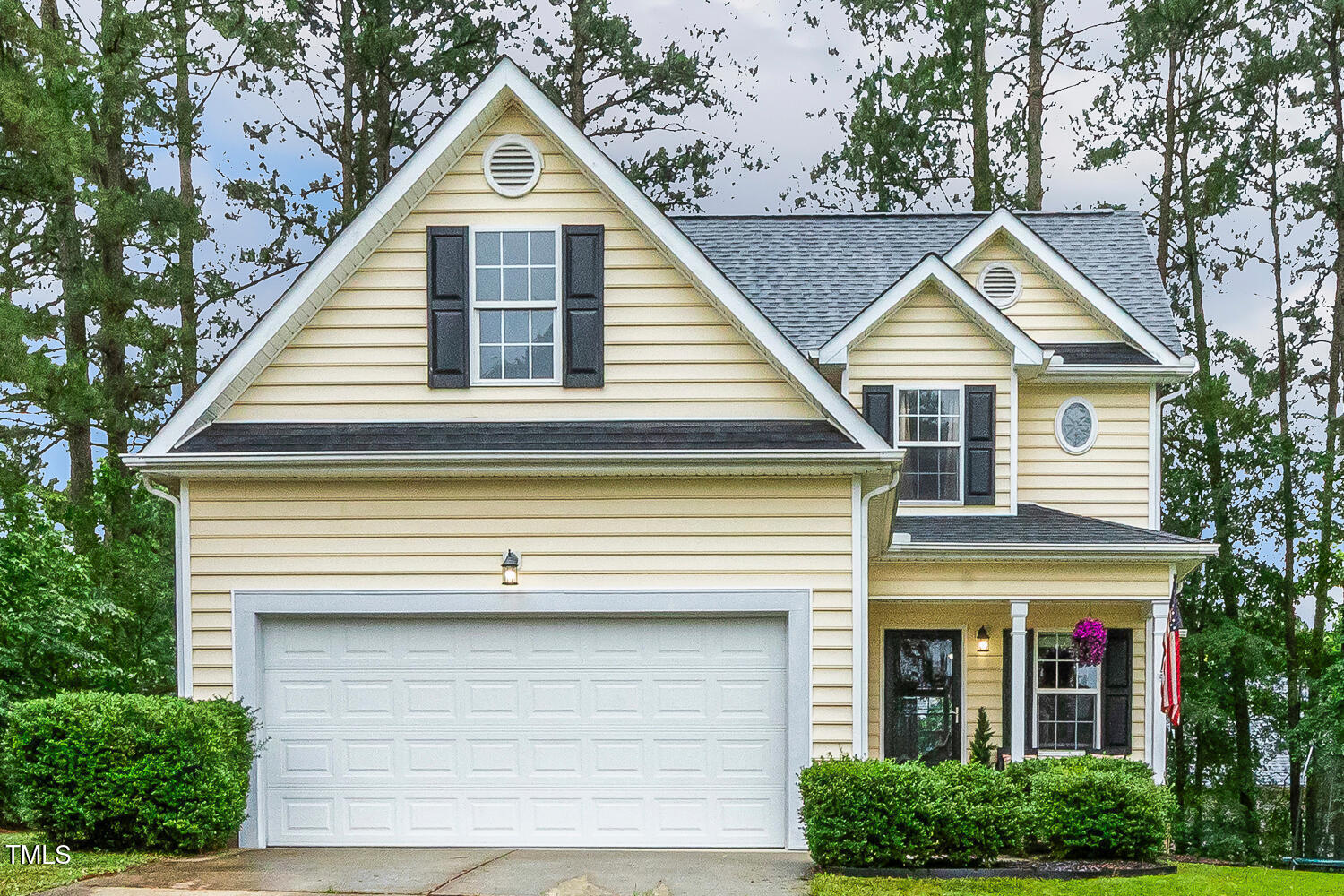 1984 Sadler Avenue Creedmoor, NC 27522 - Photo 1 of 44 a front view of a house with garage