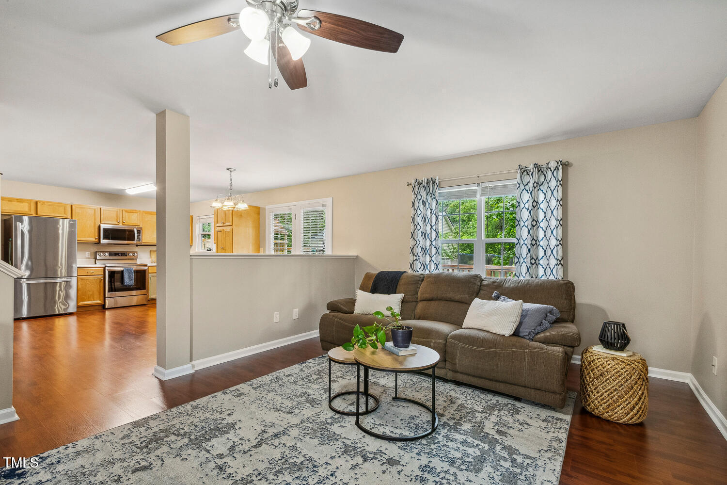1984 Sadler Avenue Creedmoor, NC 27522 - Photo 12 of 44 a living room with furniture and wooden floor