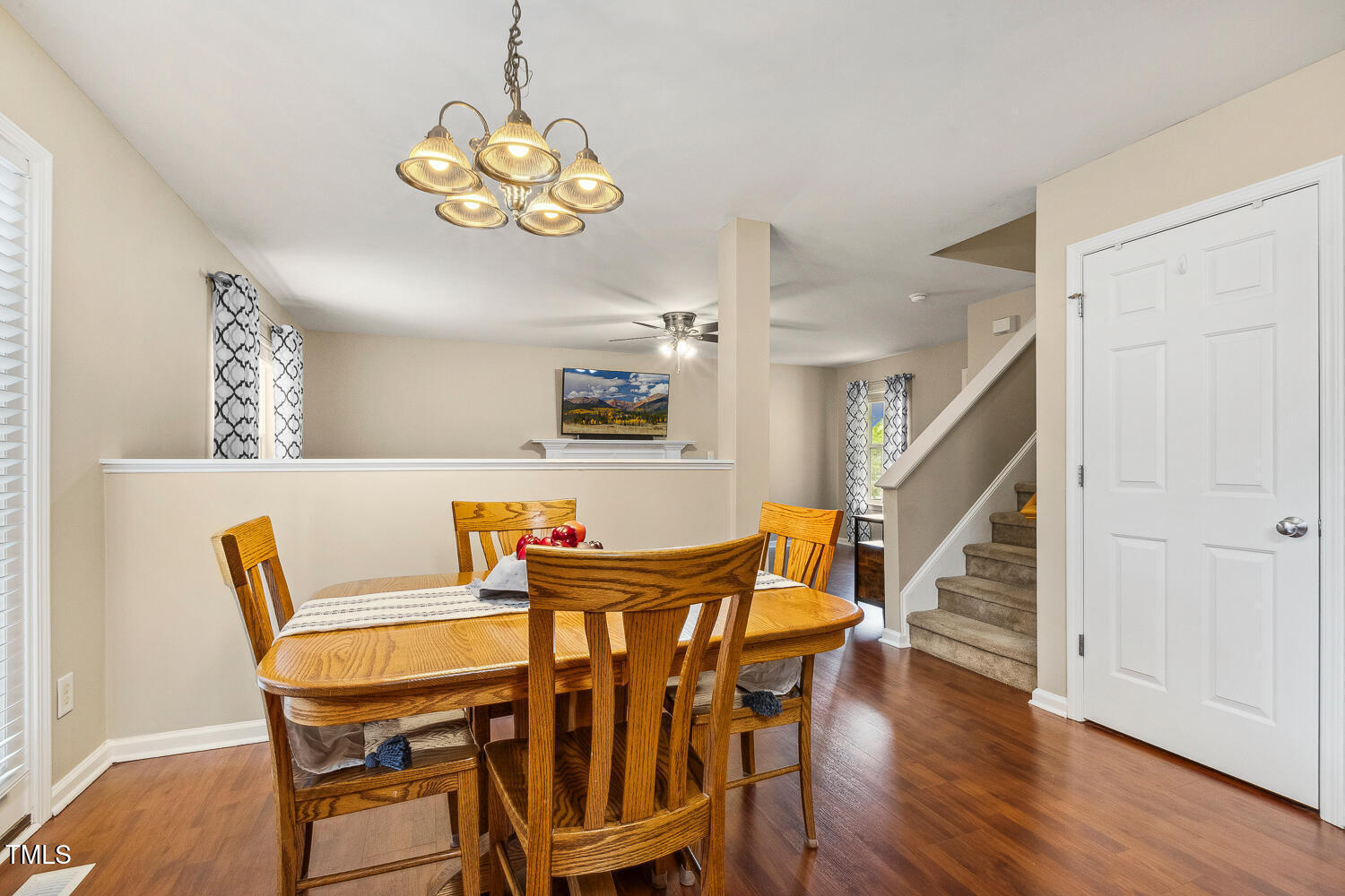 1984 Sadler Avenue Creedmoor, NC 27522 - Photo 15 of 44 a view of a dining room with furniture and wooden floor