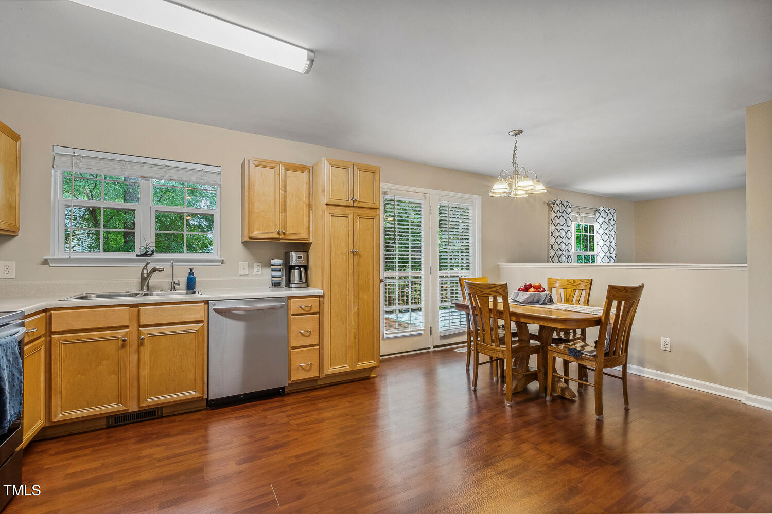 1984 Sadler Avenue Creedmoor, NC 27522 - Photo 20 of 44 a view of a dining room with furniture window and wooden floor