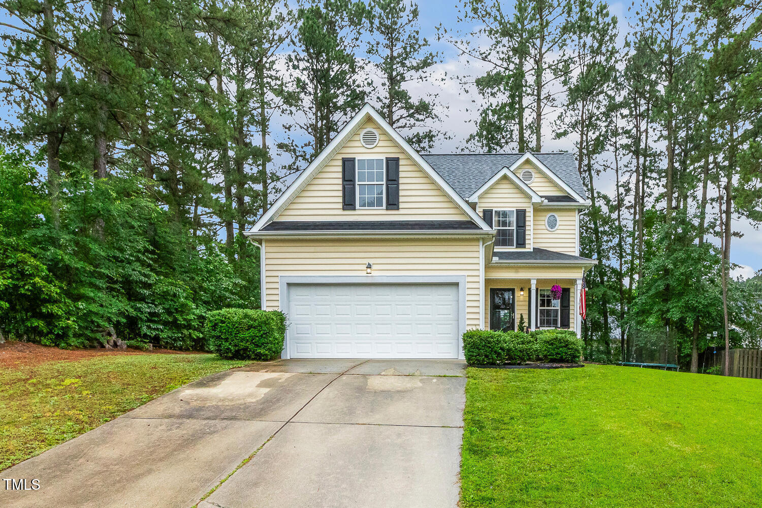 1984 Sadler Avenue Creedmoor, NC 27522 - Photo 2 of 44 a house view with a garden space