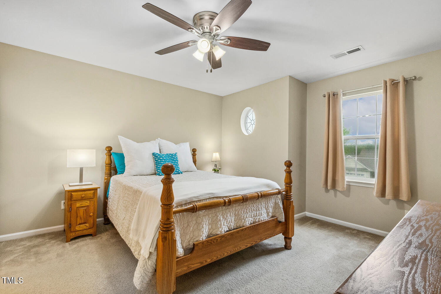 1984 Sadler Avenue Creedmoor, NC 27522 - Photo 23 of 44 a bedroom with a bed and a window