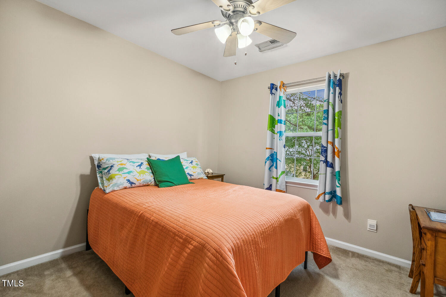 1984 Sadler Avenue Creedmoor, NC 27522 - Photo 27 of 44 a bedroom with a bed and a window