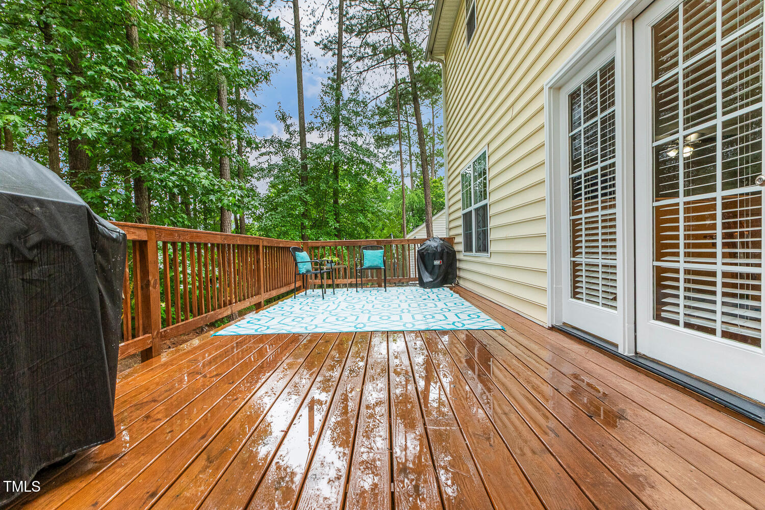 1984 Sadler Avenue Creedmoor, NC 27522 - Photo 32 of 44 a view of outdoor space with deck and wooden floor