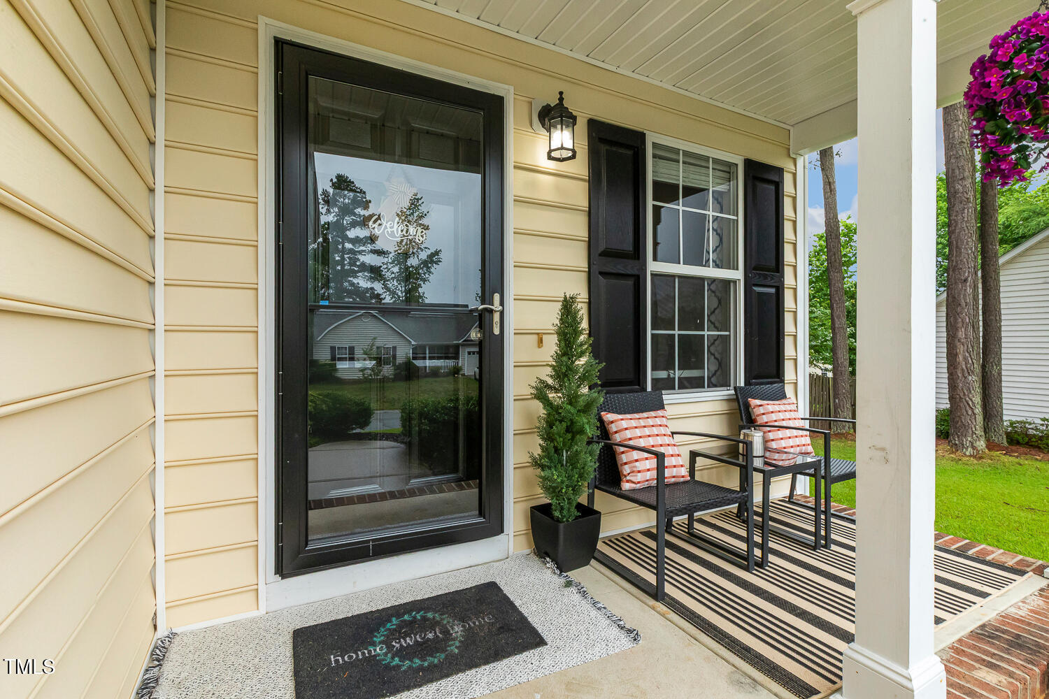 1984 Sadler Avenue Creedmoor, NC 27522 - Photo 4 of 44 a view of a bench in front of house