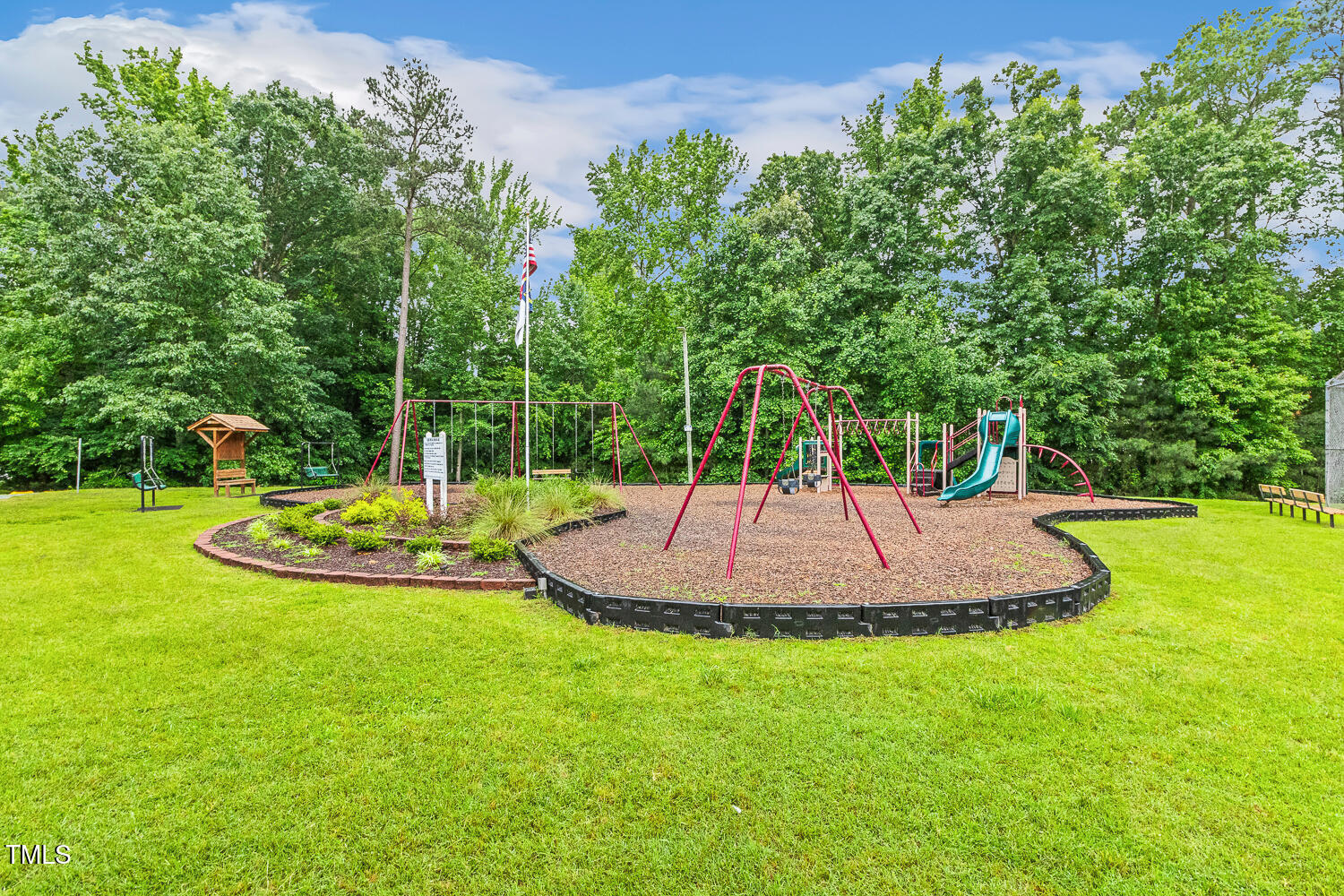 1984 Sadler Avenue Creedmoor, NC 27522 - Photo 42 of 44 a view of a fountain in the backyard of house