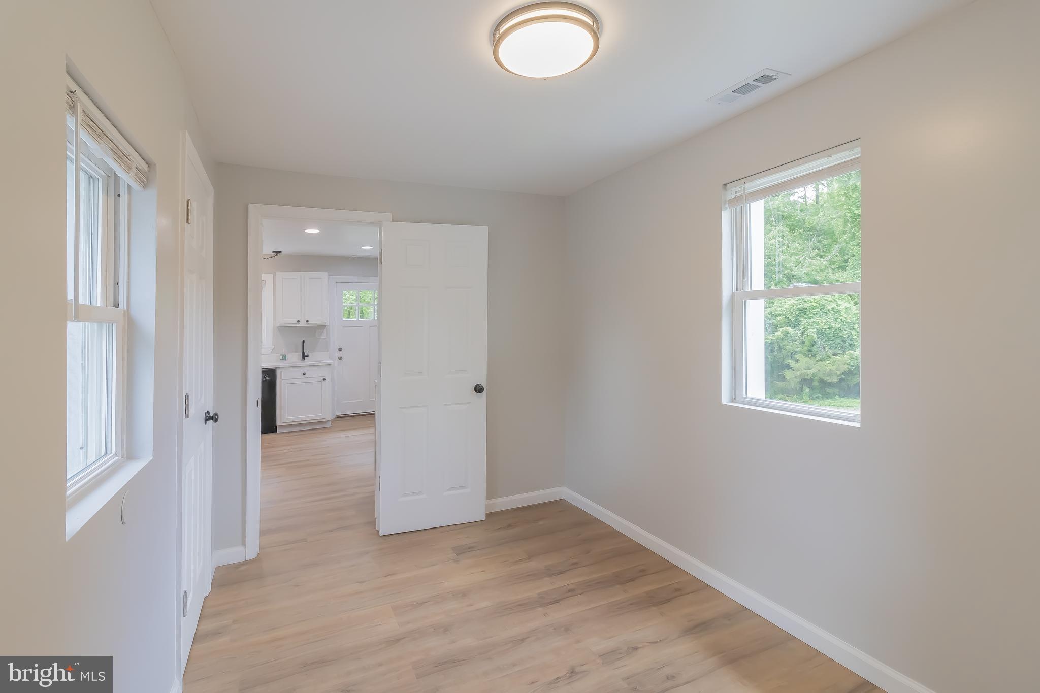 1816 Maple Lane Accokeek, MD 20607 - Photo 15 of 24 an empty room with windows and closet