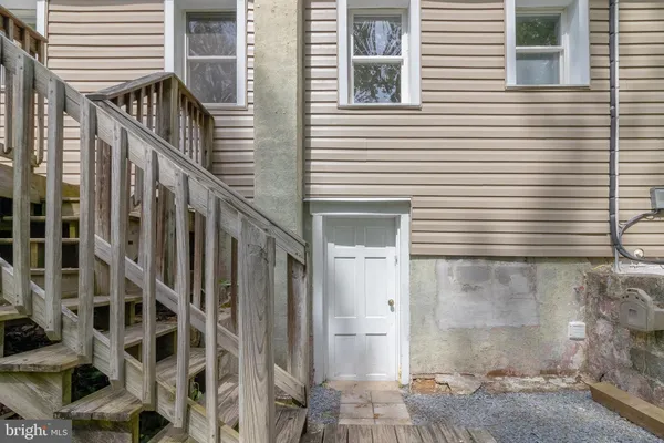 a view of wooden door of a house