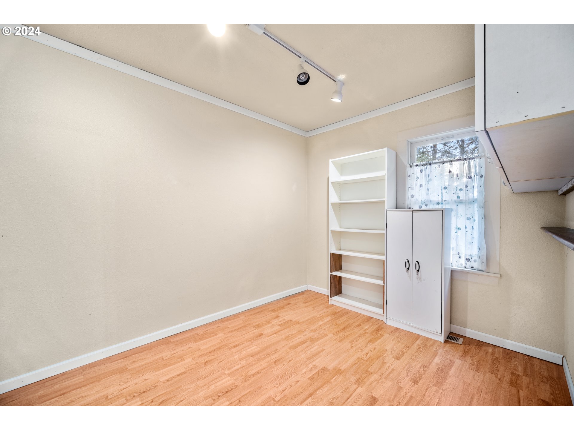 225 Nikula Road Winlock, WA 98596 - Photo 33 of 35 a big room with closet and wooden floor
