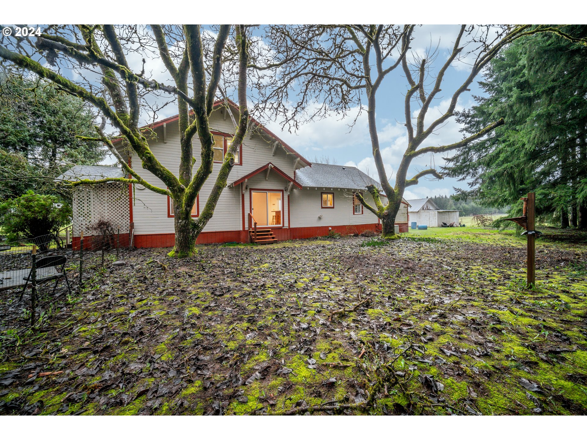 225 Nikula Road Winlock, WA 98596 - Photo 8 of 35 a backyard of a house with lots of green space