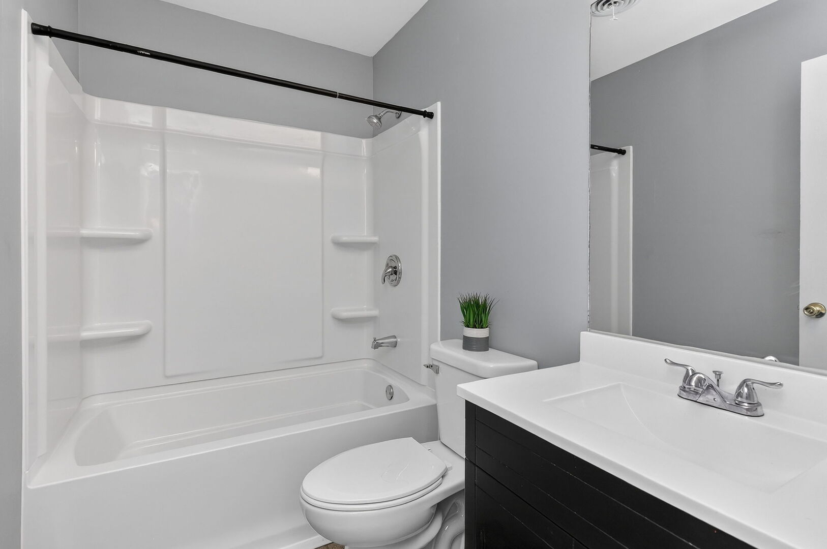 14816 South Penn Road Plainfield, IL 60544 - Photo 12 of 23 a bathroom with a sink a toilet and a bathtub