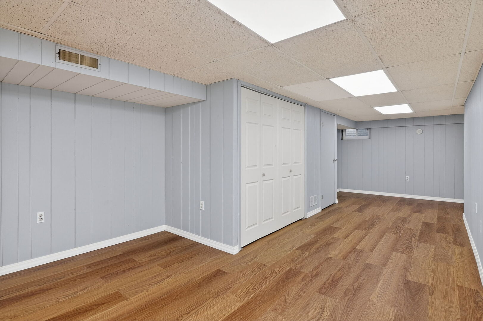 14816 South Penn Road Plainfield, IL 60544 - Photo 14 of 23 a view of an empty room with wooden floor