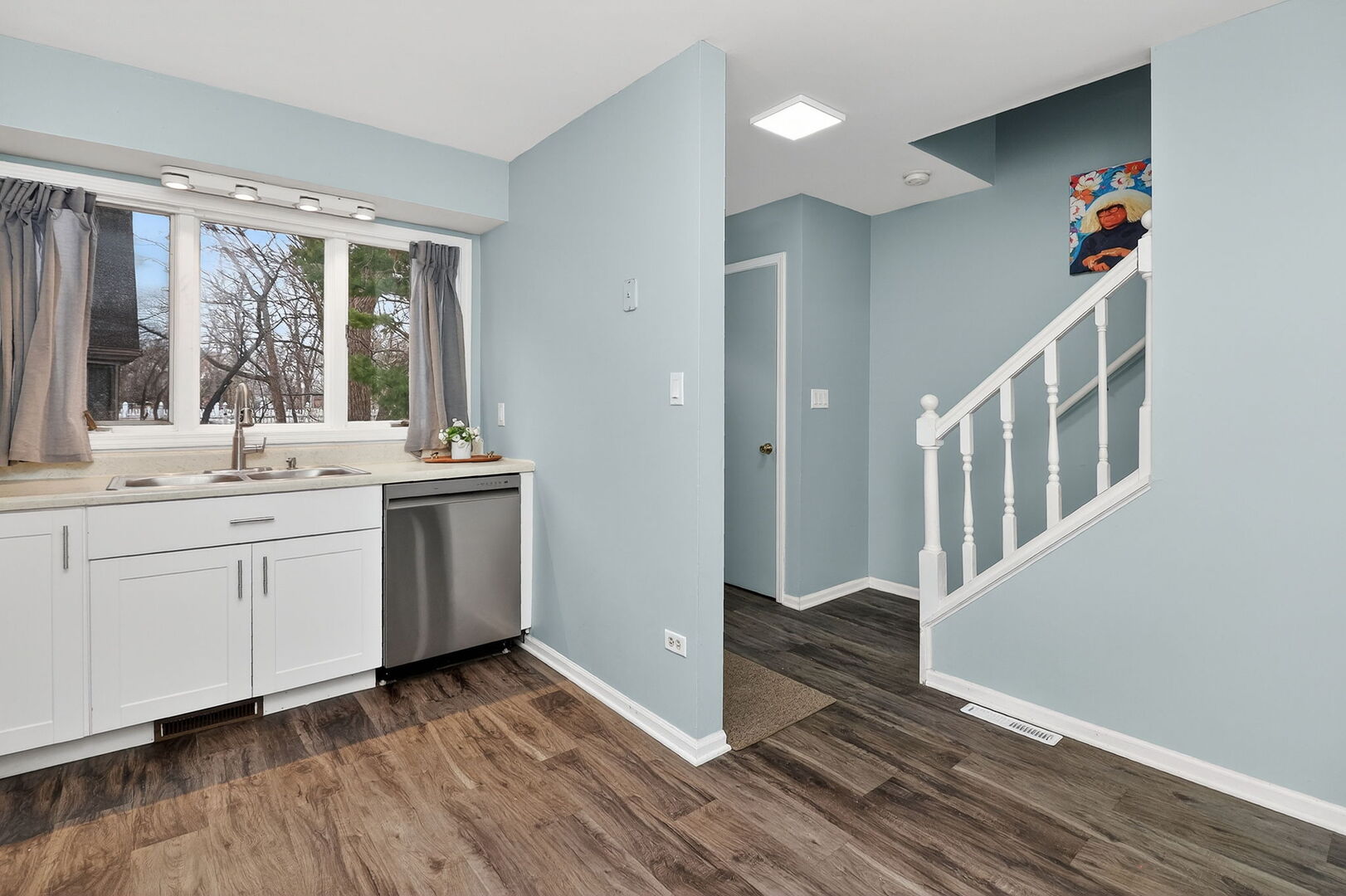 14816 South Penn Road Plainfield, IL 60544 - Photo 2 of 23 a kitchen with a sink and wooden floor