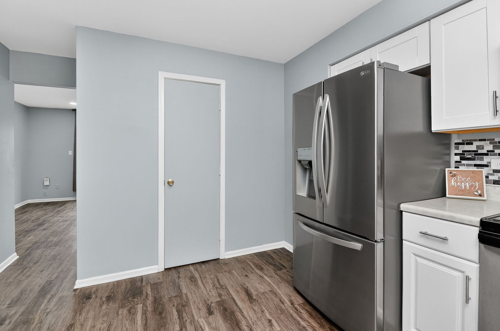 14816 South Penn Road Plainfield, IL 60544 - Photo 5 of 23 a kitchen with stainless steel appliances a refrigerator and a stove top oven