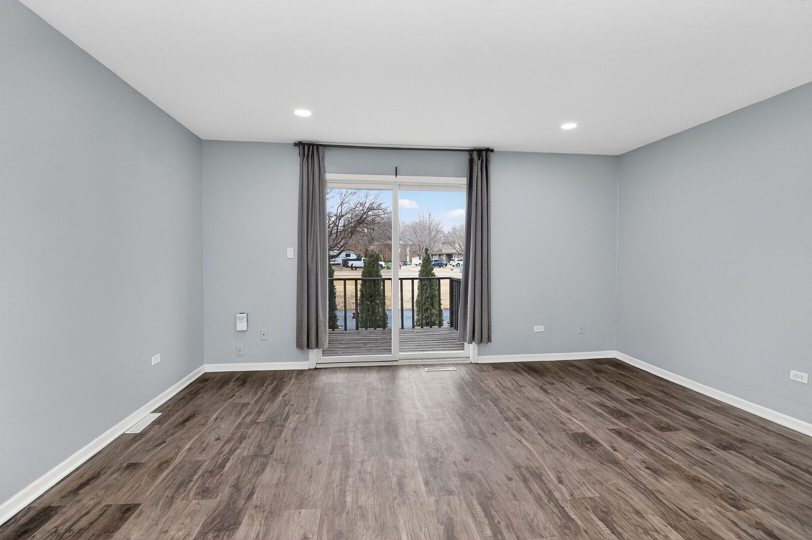 14816 South Penn Road Plainfield, IL 60544 - Photo 6 of 23 a view of wooden floor and brick walls