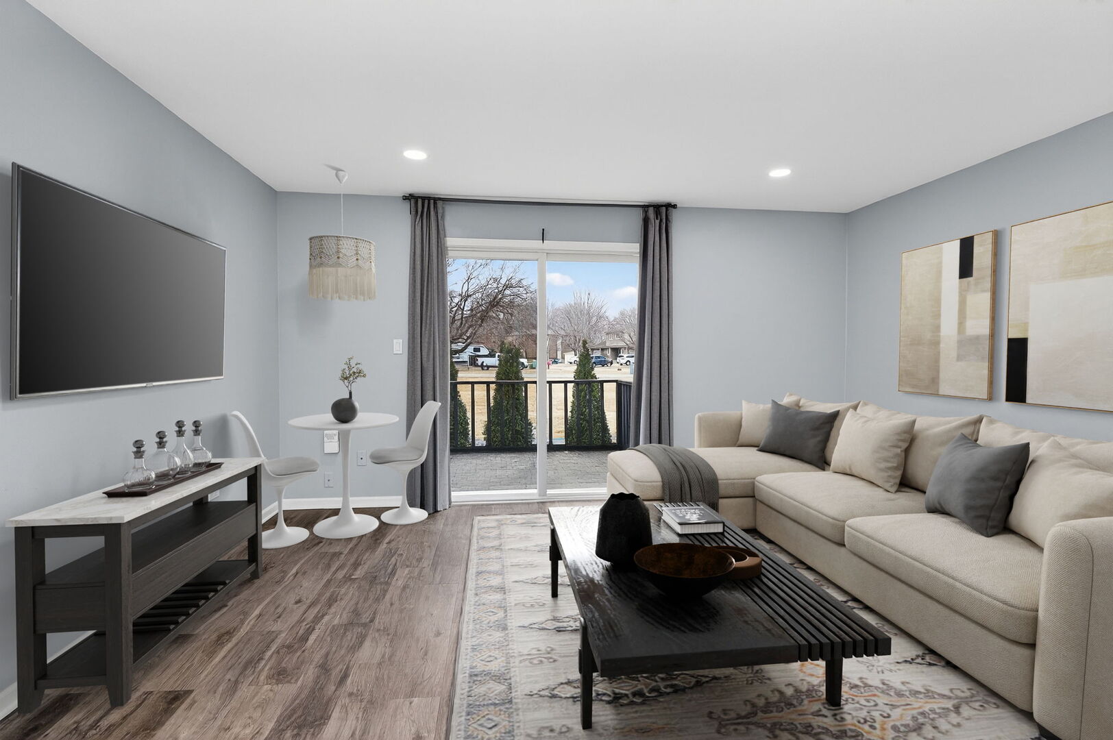 14816 South Penn Road Plainfield, IL 60544 - Photo 7 of 23 a living room with furniture and a flat screen tv